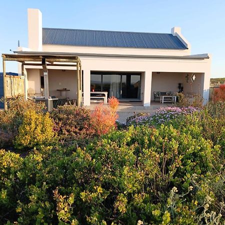 לאנגבאן Camelot Cottages מראה חיצוני תמונה